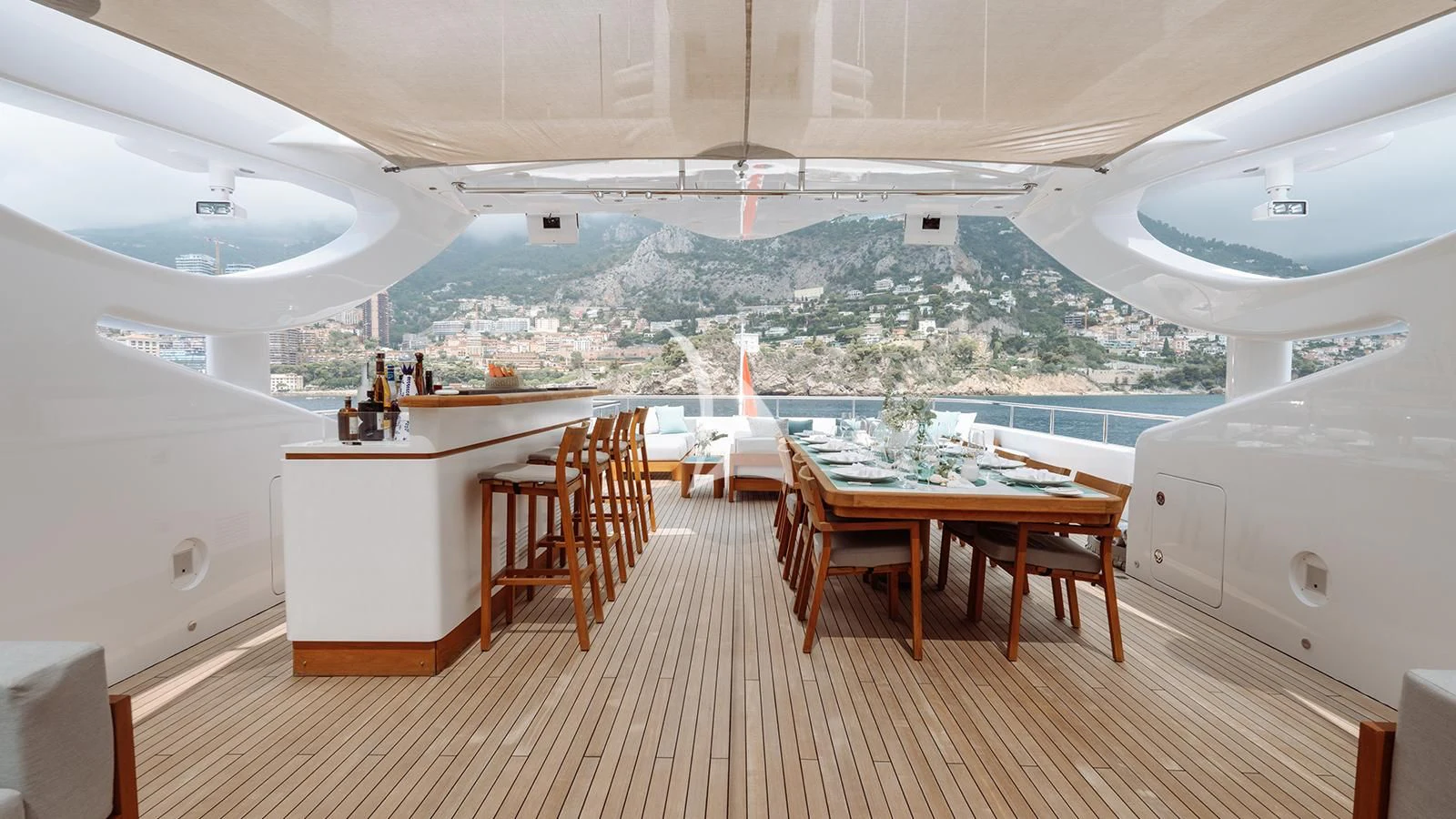 a room with a table and chairs aboard BON VIVANT Yacht for Sale