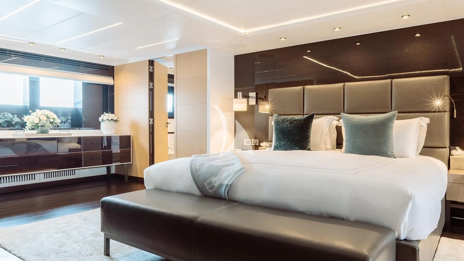 a bed in a room aboard BON VIVANT Yacht for Sale