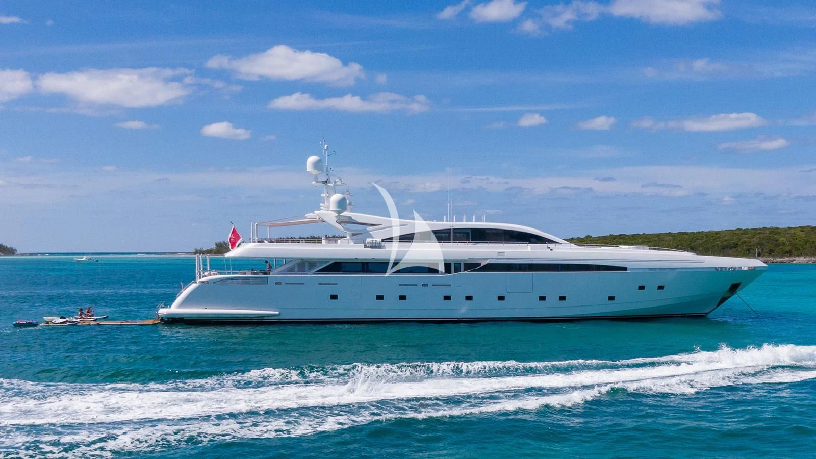 a white yacht on the water aboard BON VIVANT Yacht for Sale