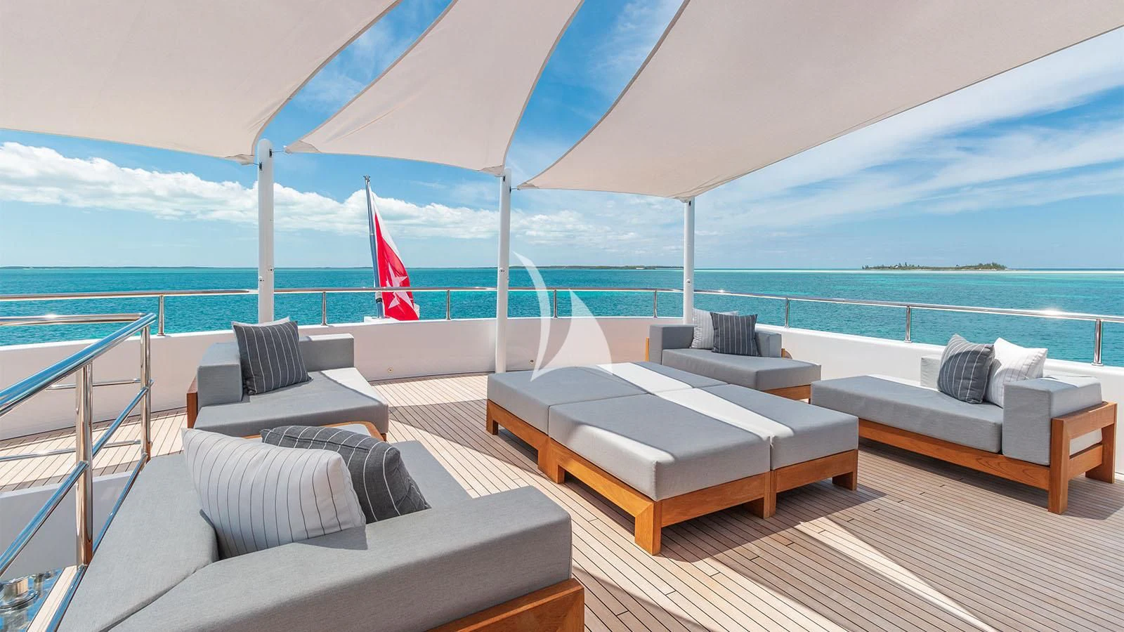 a large bed on a deck aboard BON VIVANT Yacht for Sale