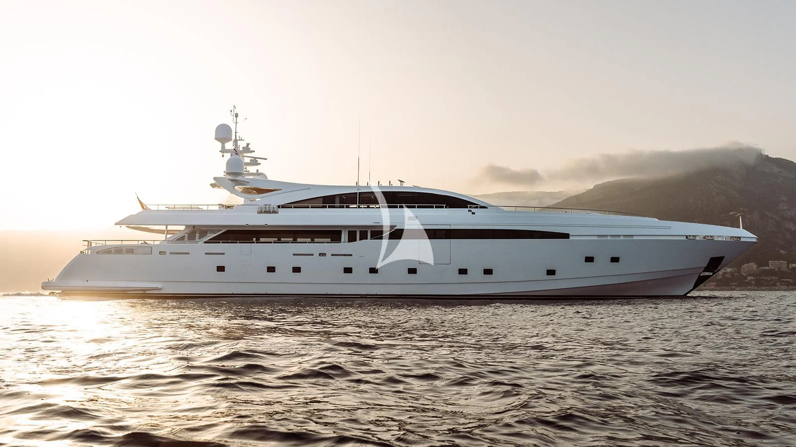 a white yacht on the water aboard BON VIVANT Yacht for Sale