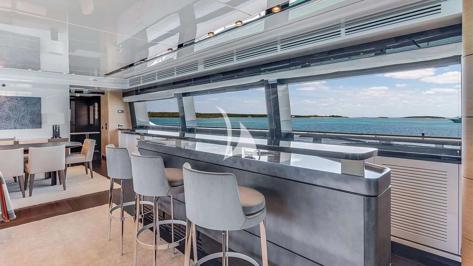 a room with a table and chairs aboard BON VIVANT Yacht for Sale