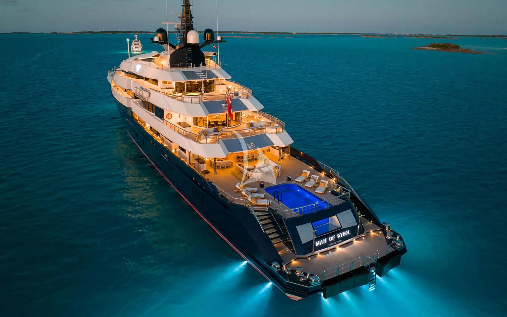 a large ship in the water aboard MAN OF STEEL Yacht for Charter