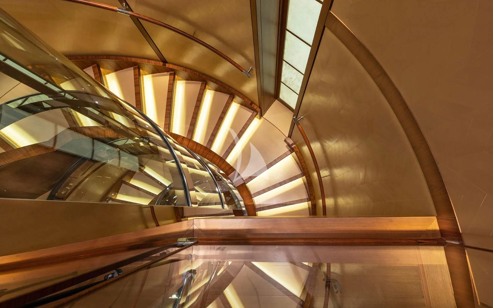 a view looking up at the glass ceiling of a building aboard MAN OF STEEL Yacht for Charter