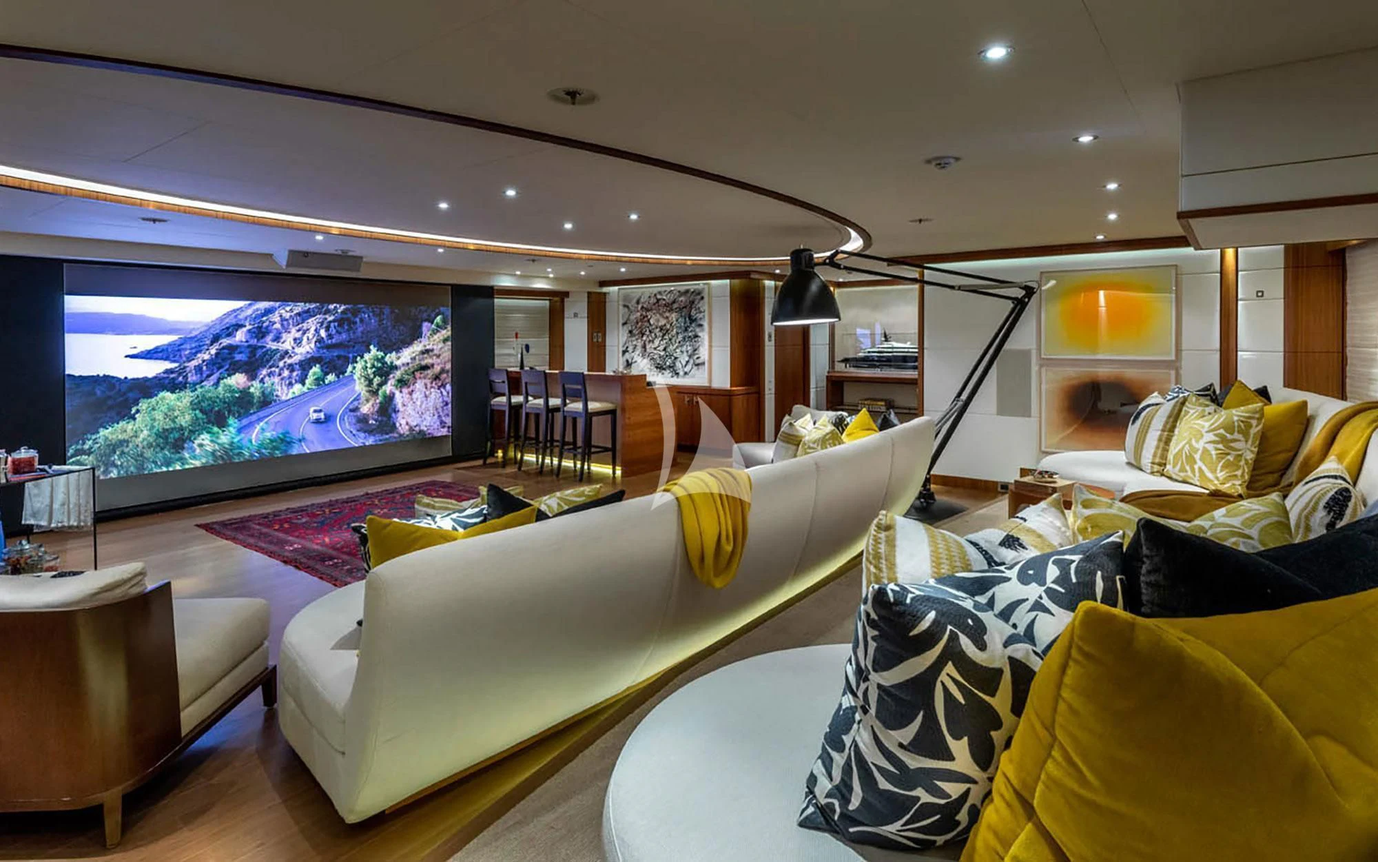 a living room with a large window aboard MAN OF STEEL Yacht for Charter