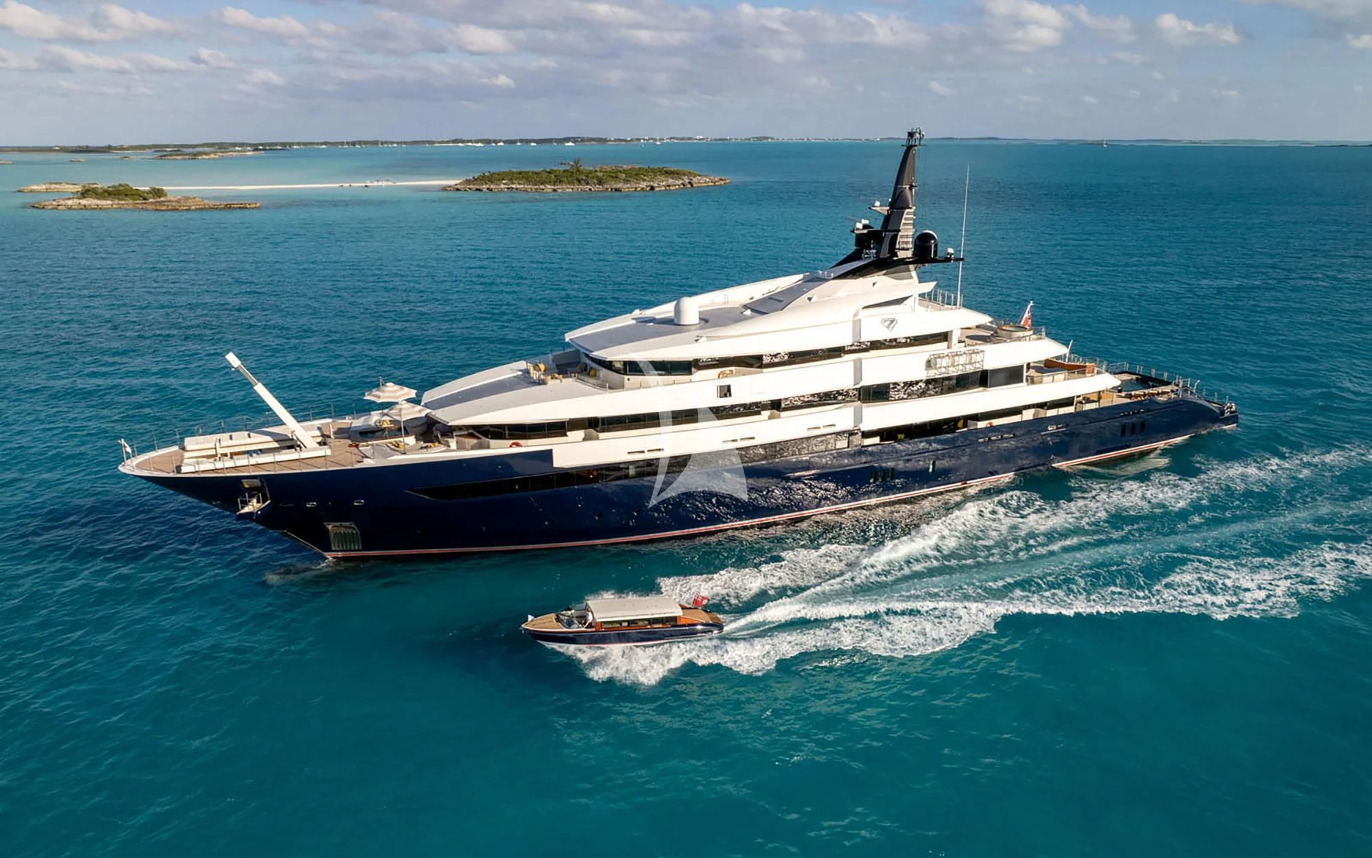 a large ship in the water aboard MAN OF STEEL Yacht for Charter