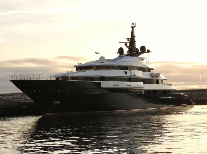 a large ship docked aboard MAN OF STEEL Yacht for Charter