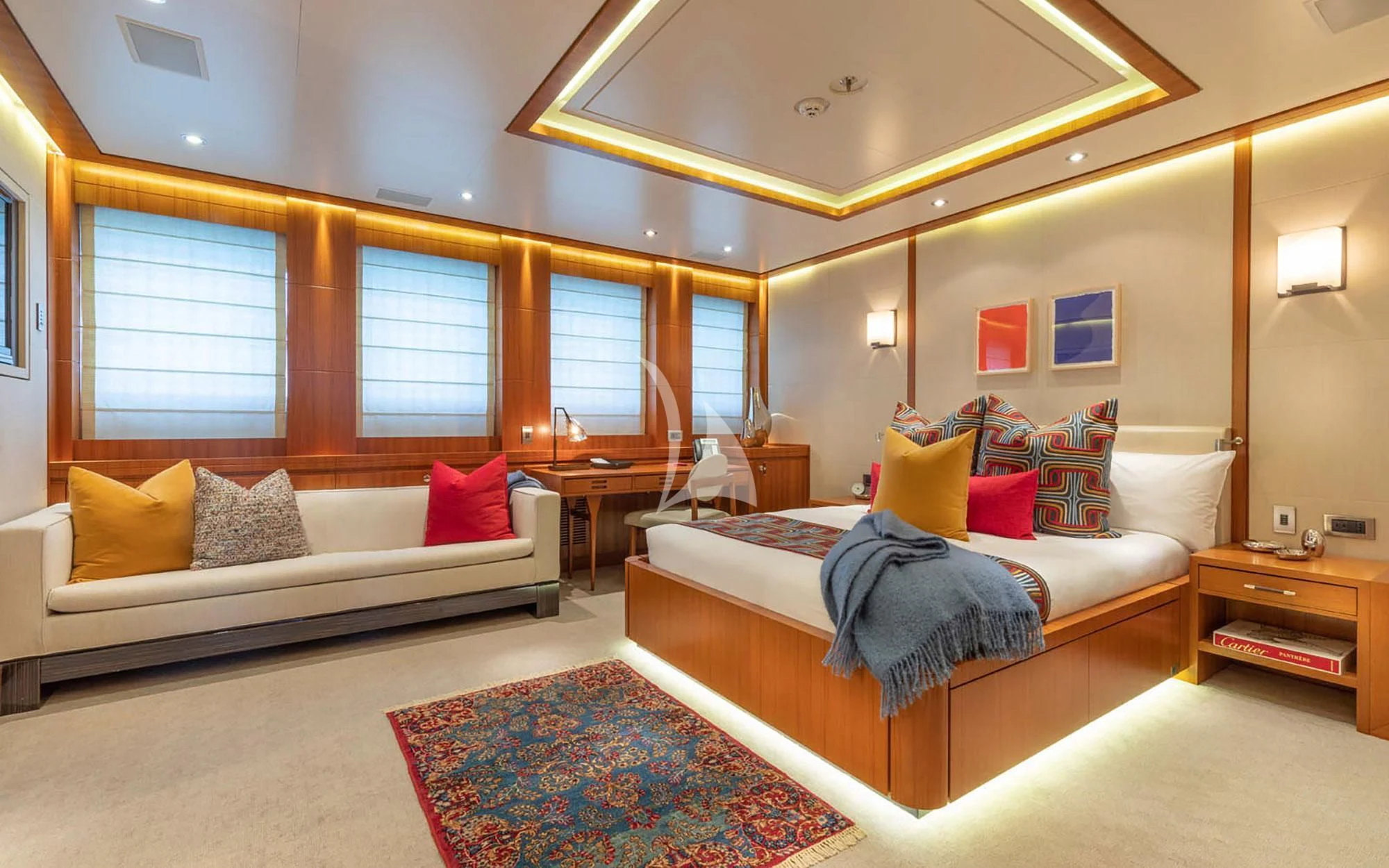 a large bedroom with a large bed aboard MAN OF STEEL Yacht for Charter
