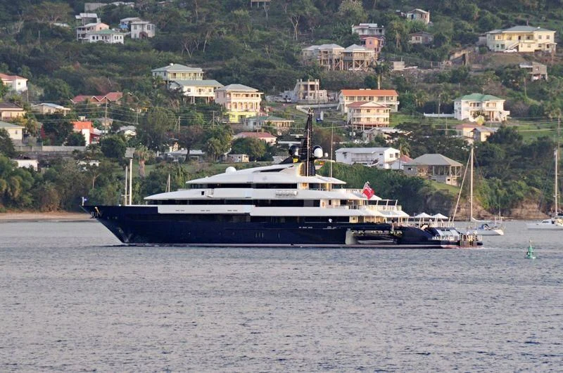 a large boat in the water aboard MAN OF STEEL Yacht for Charter