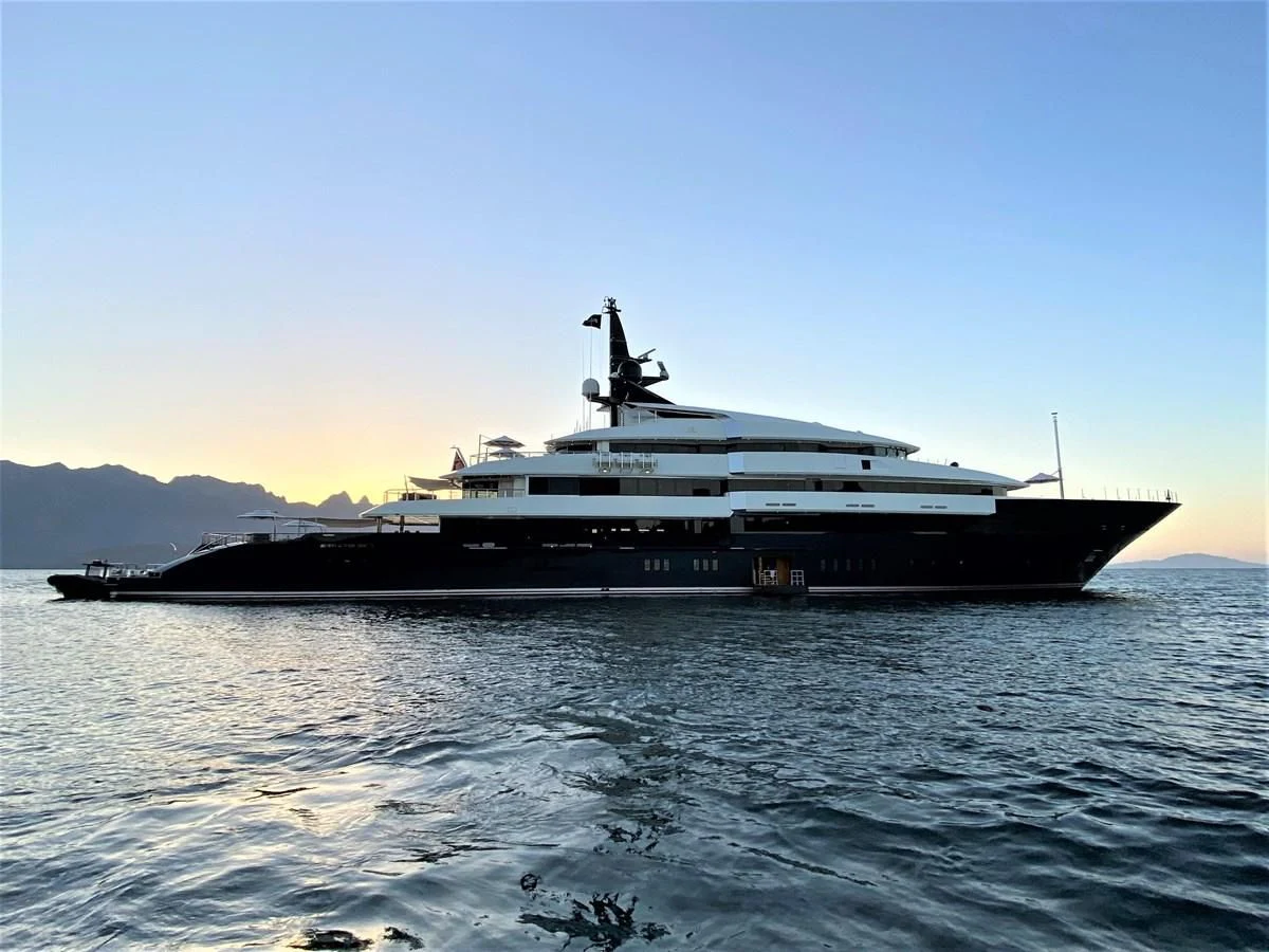 a large ship in the water aboard MAN OF STEEL Yacht for Charter