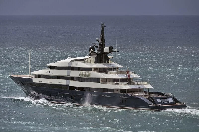 a large ship in the water aboard MAN OF STEEL Yacht for Charter