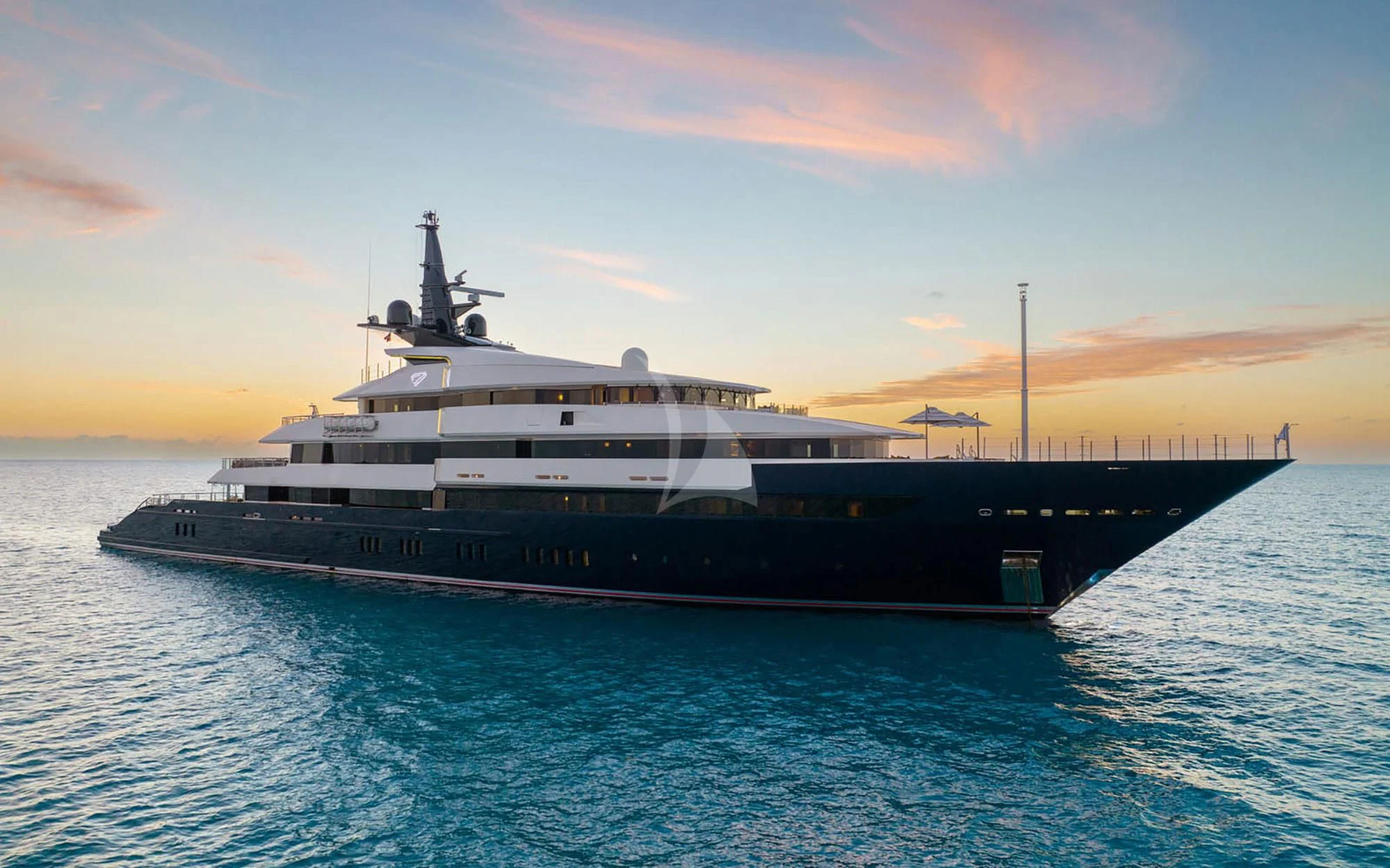 a large ship in the water aboard MAN OF STEEL Yacht for Charter