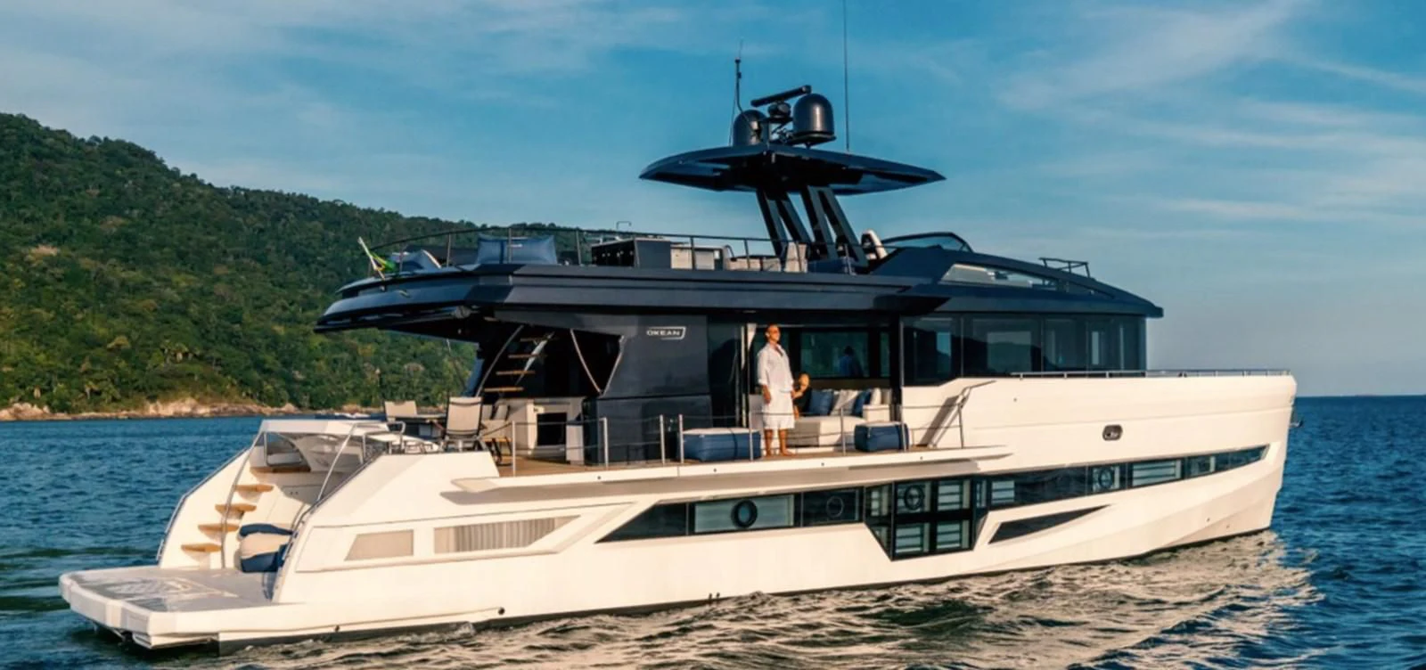 a boat with a person on it aboard OKEAN 80/01 Yacht for Sale