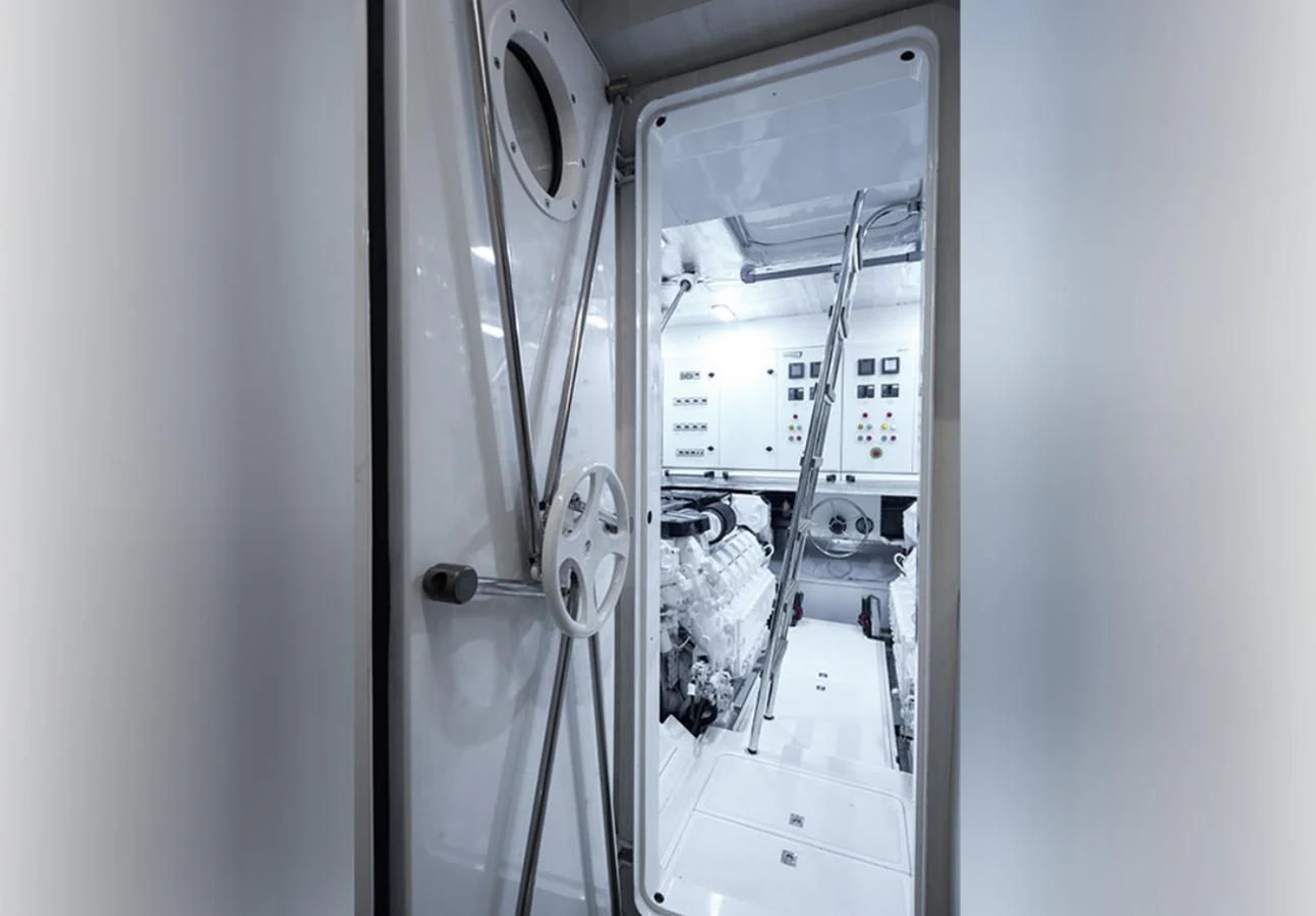 a machine with a door open aboard OKEAN 80/01 Yacht for Sale