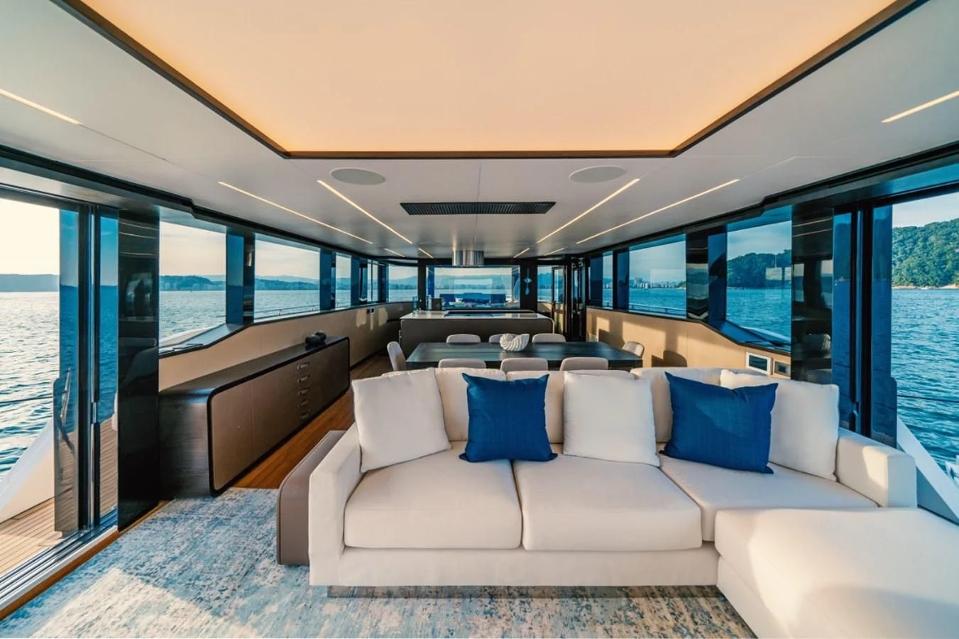 a white couch in a room aboard OKEAN 80/01 Yacht for Sale