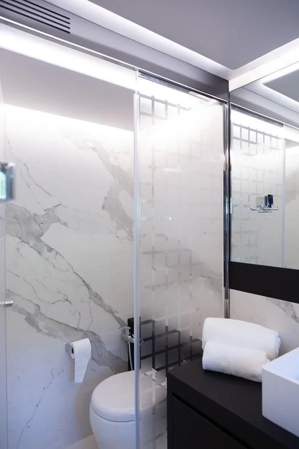 a bathroom with a shower aboard OKEAN 80/01 Yacht for Sale