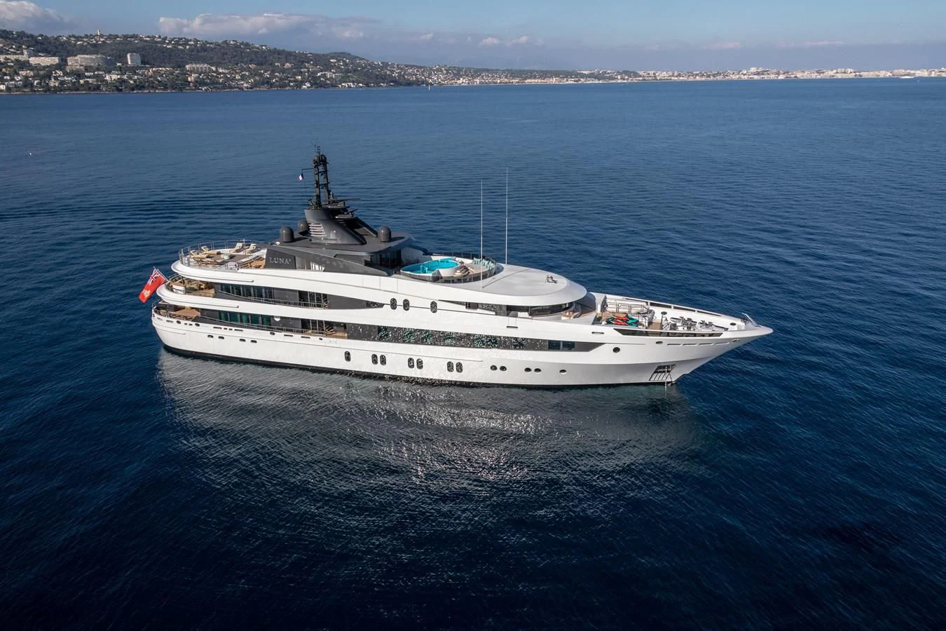 a large white ship in the water aboard AHS Yacht for Sale