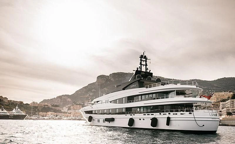 a white boat on the water aboard AHS Yacht for Sale