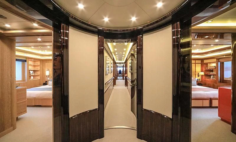 a hallway with a glass door aboard AHS Yacht for Sale