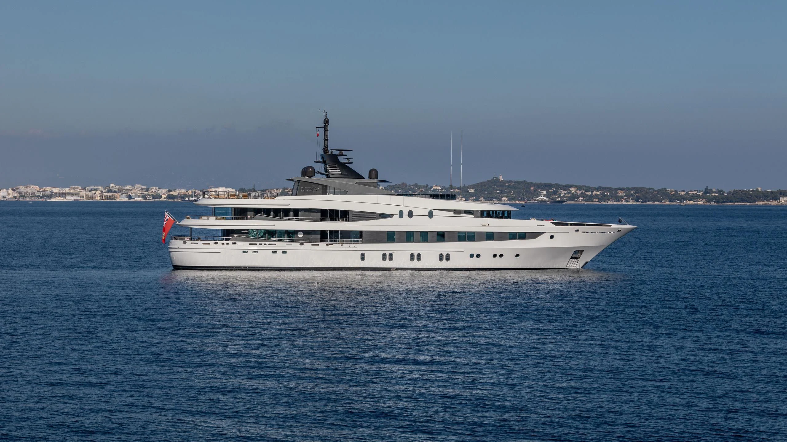 a large white ship in the water aboard AHS Yacht for Sale