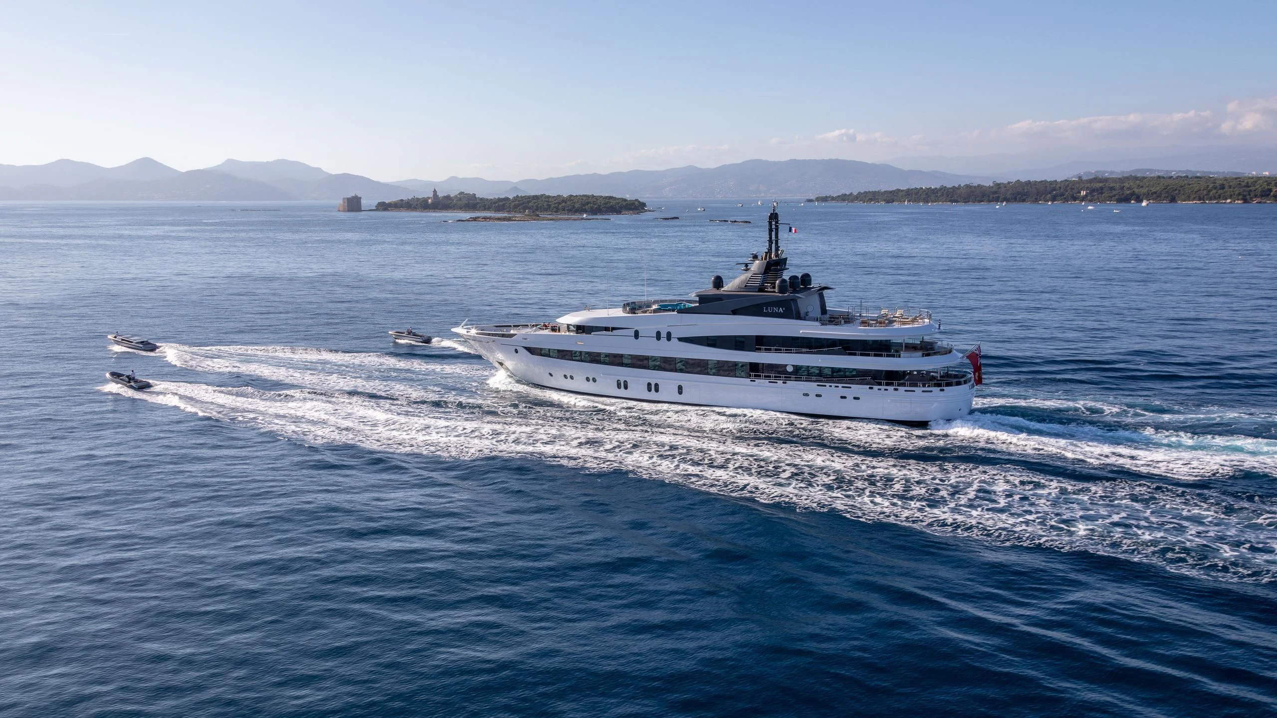 a large boat on the water aboard AHS Yacht for Sale