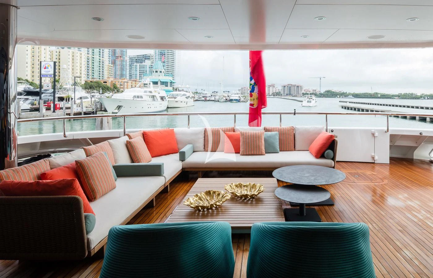 a living room with a large window aboard HALO Yacht for Charter