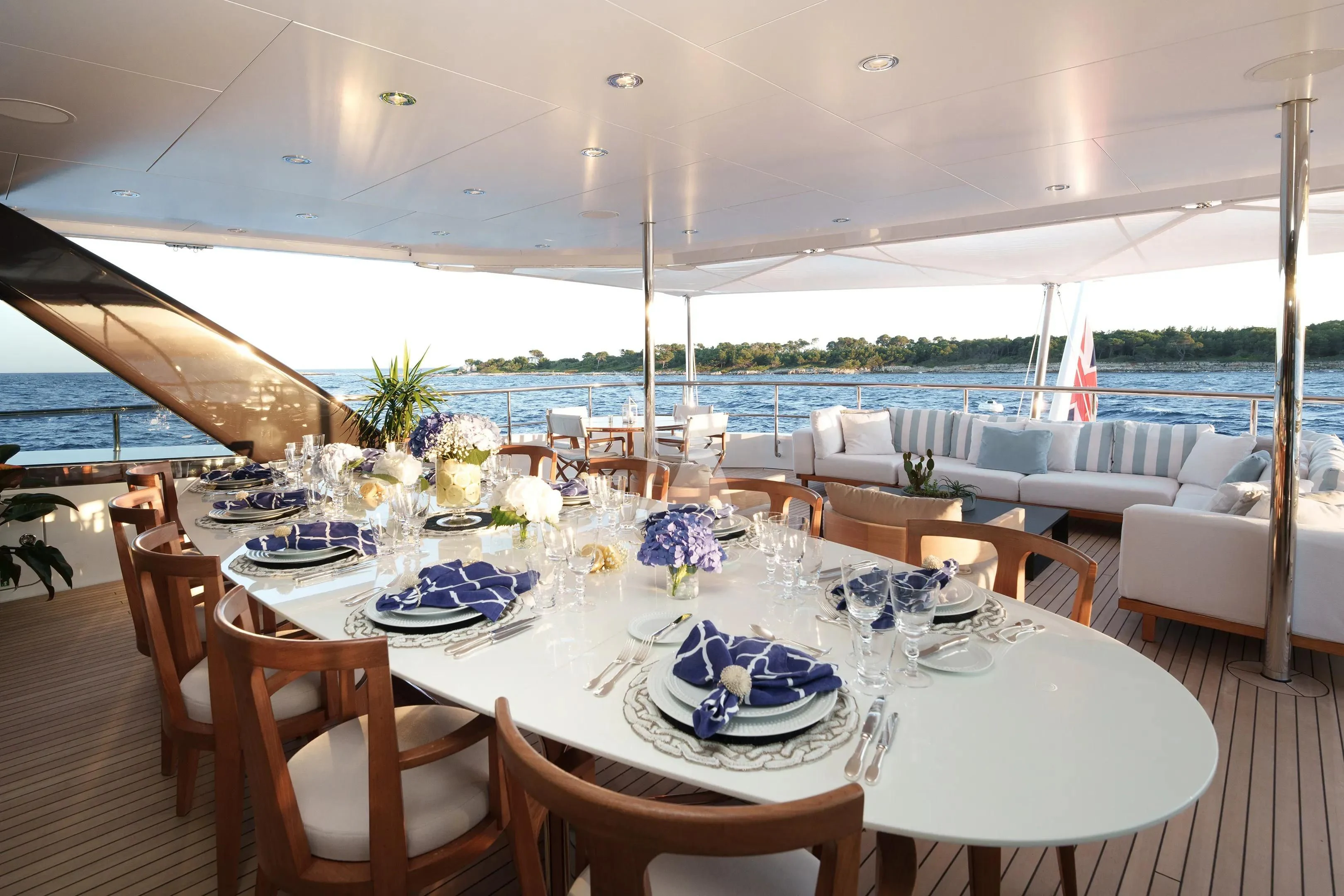 a table set for a dinner aboard HALO Yacht for Charter