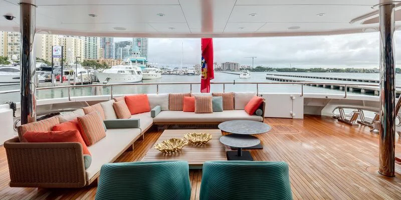 a living room with a large window aboard HALO Yacht for Charter