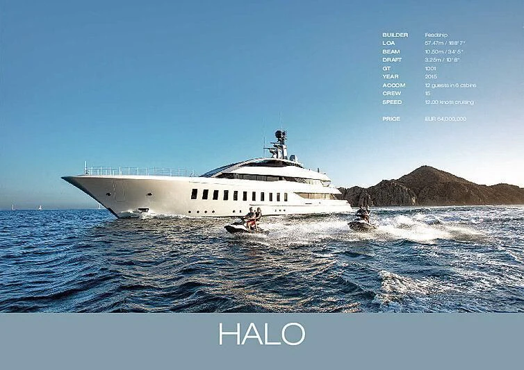 a white boat on the water aboard HALO Yacht for Charter