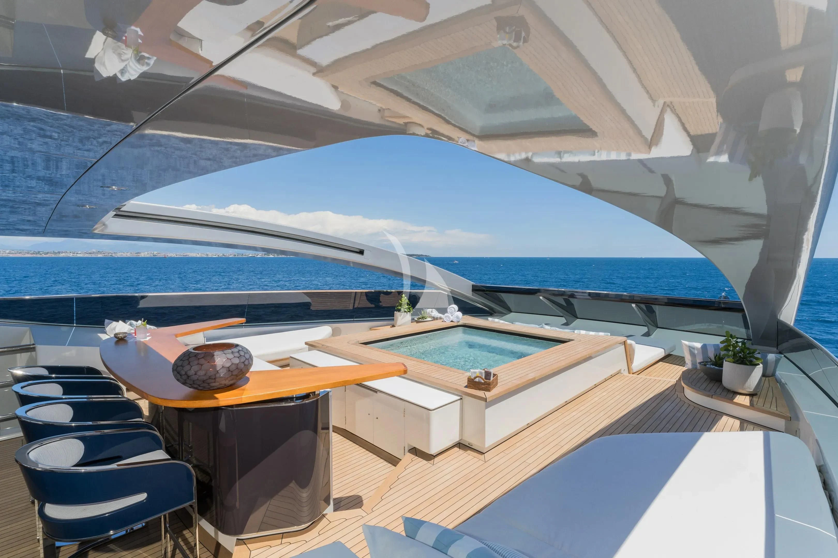 a room with a table and chairs aboard HALO Yacht for Charter