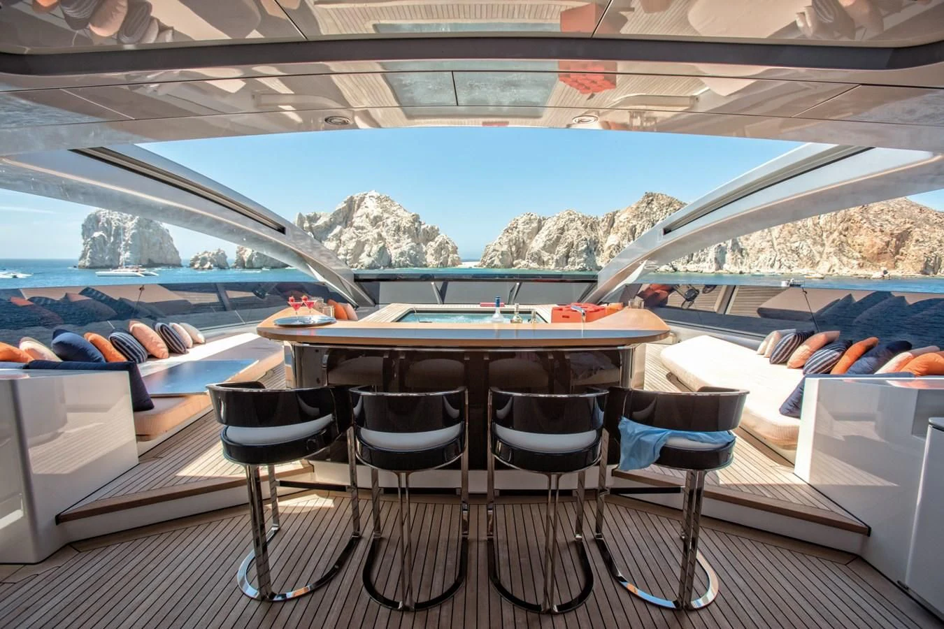 a table and chairs in a room aboard HALO Yacht for Charter