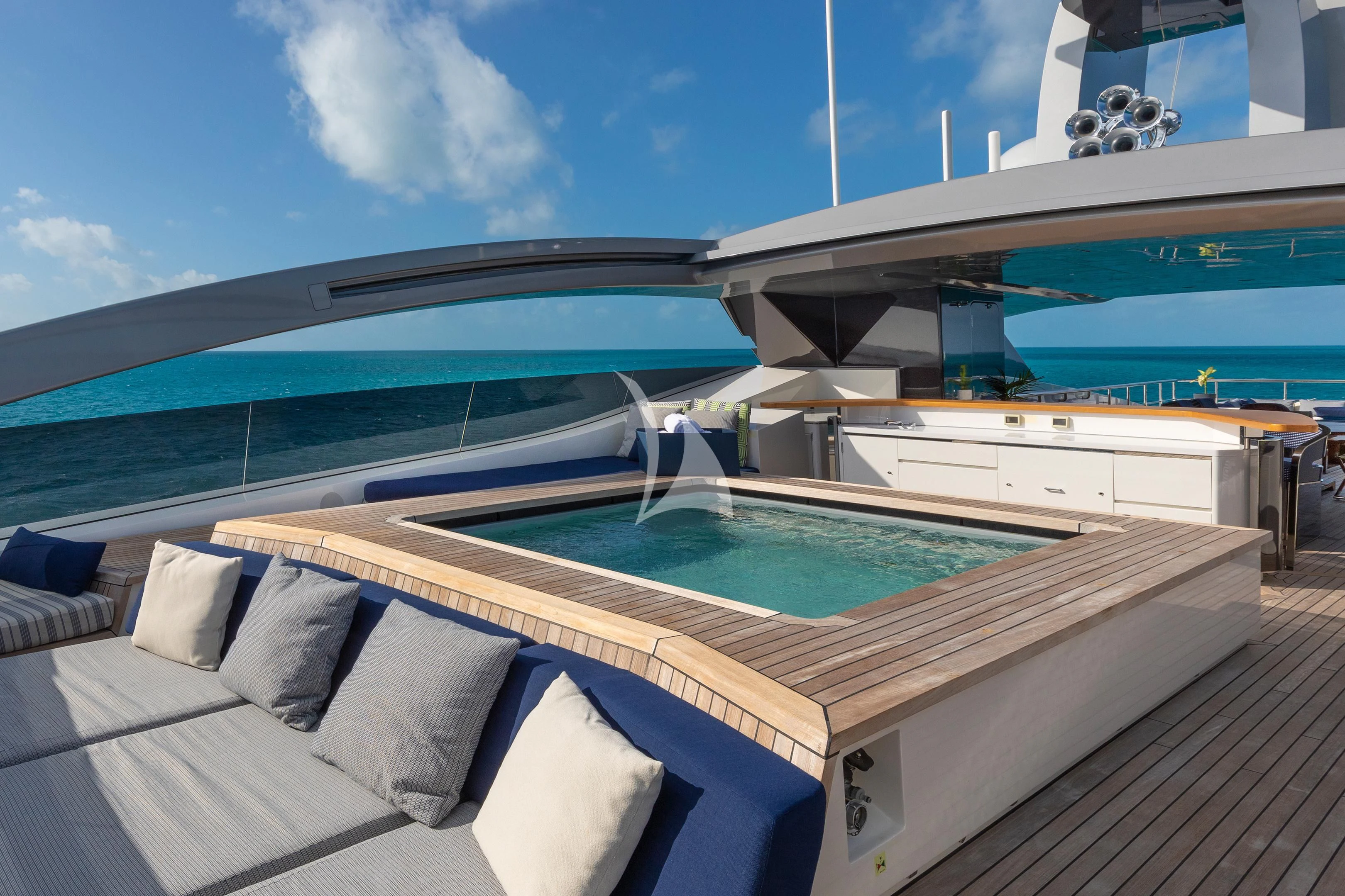 a pool on a boat aboard HALO Yacht for Charter