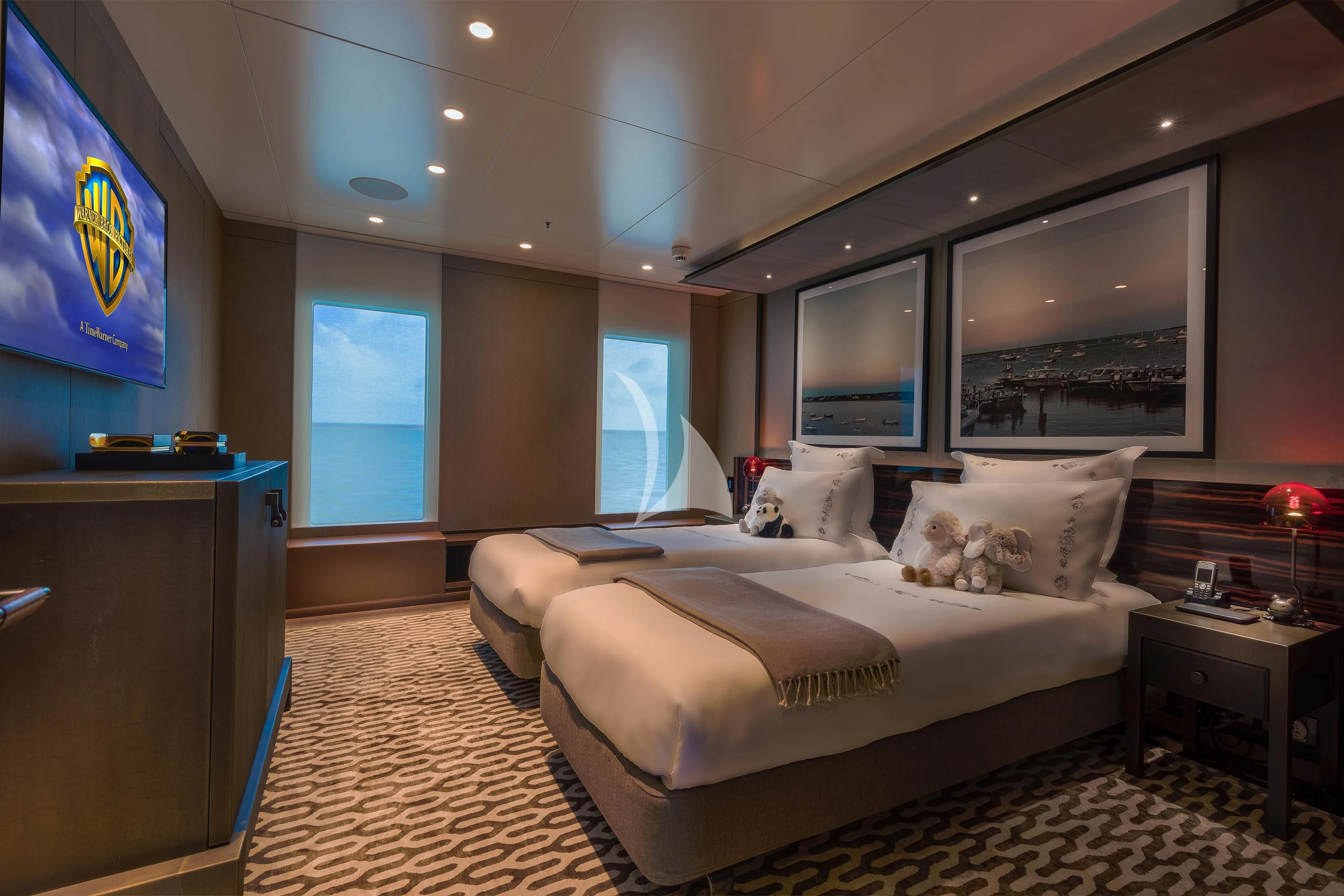 a large bedroom with a large bed aboard HALO Yacht for Charter