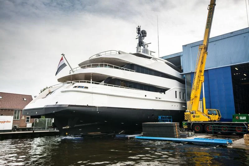 a large white boat docked aboard HALO Yacht for Charter