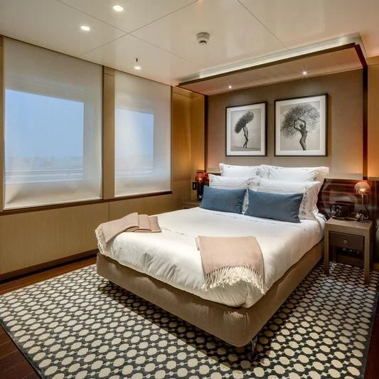 a bed in a room aboard HALO Yacht for Charter