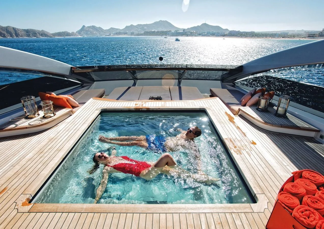 a person lying on a boat aboard HALO Yacht for Charter