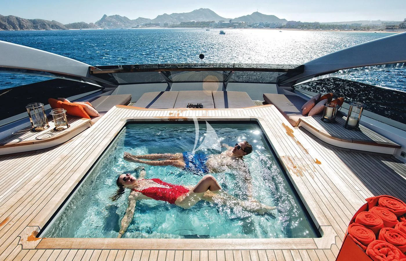 a person lying on a boat aboard HALO Yacht for Charter