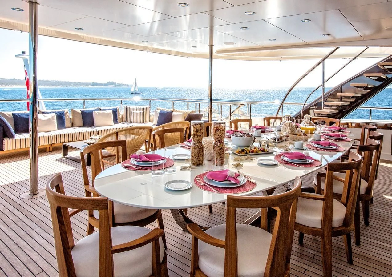 a table set for a meal aboard HALO Yacht for Charter