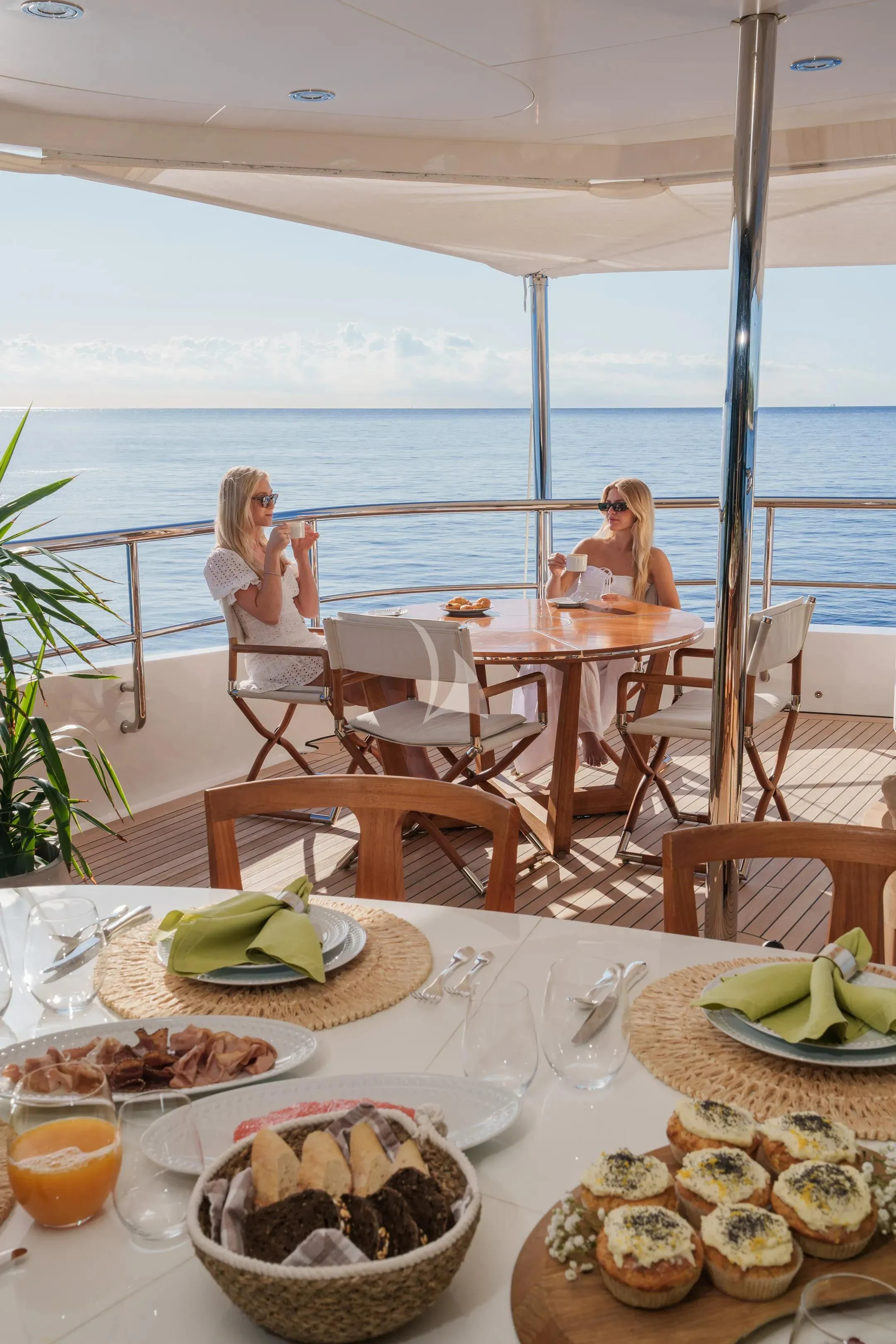 a table with food on it aboard HALO Yacht for Charter