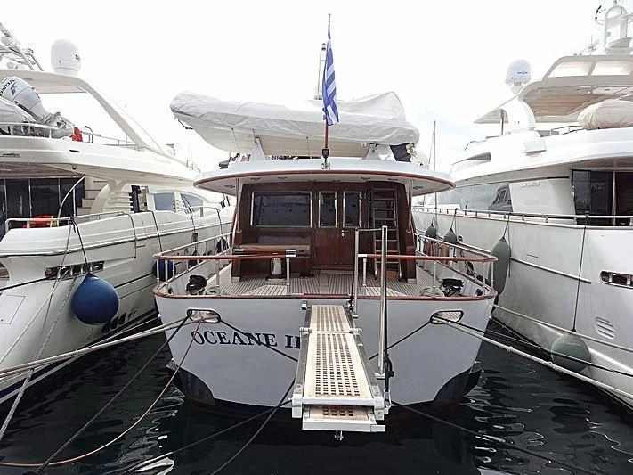 a group of boats are parked in a harbor aboard OCEANE II Yacht for Sale