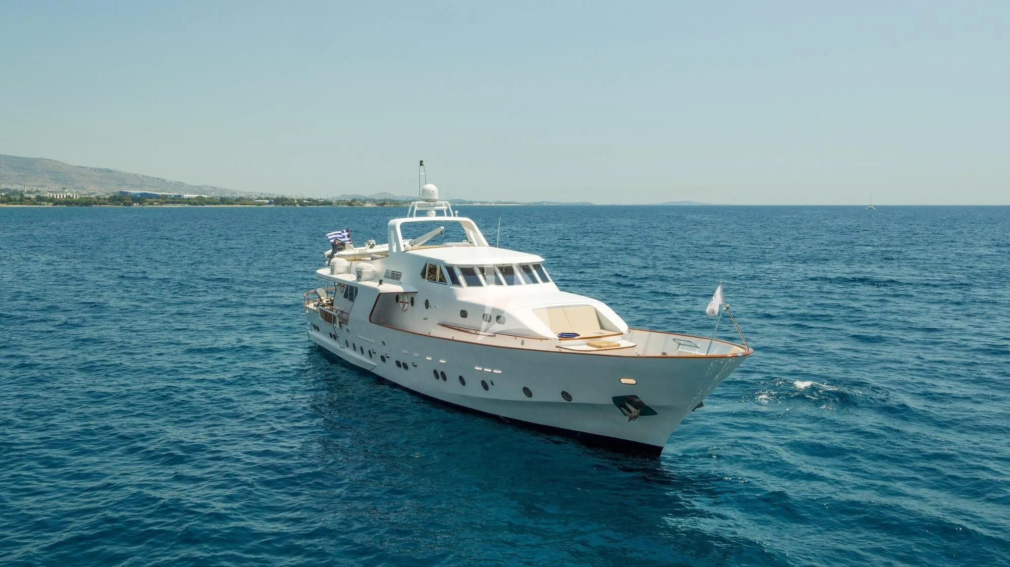 a white boat in the water aboard OCEANE II Yacht for Sale