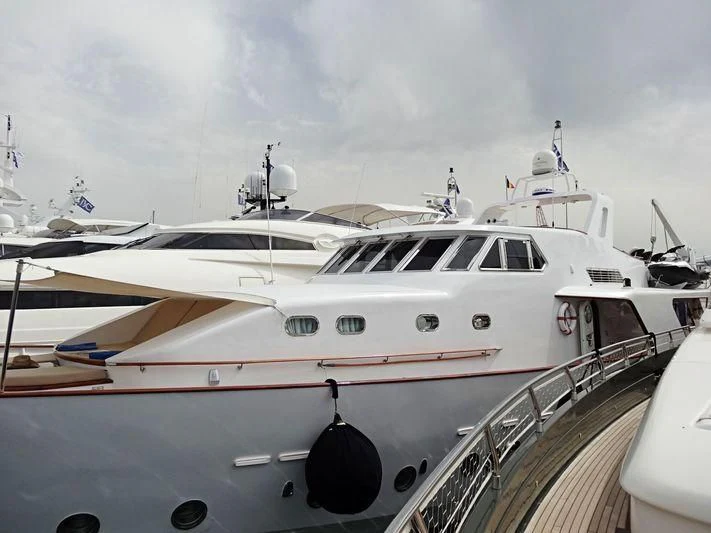 a large white yacht docked aboard OCEANE II Yacht for Sale