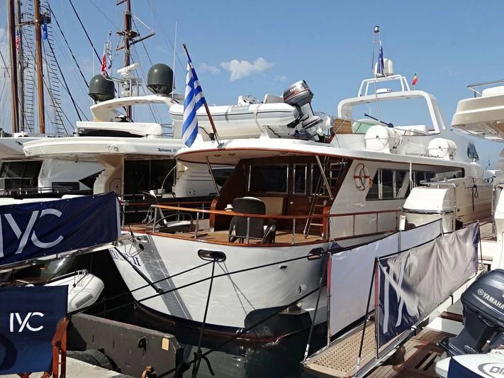 a boat with a flag on the front aboard OCEANE II Yacht for Sale