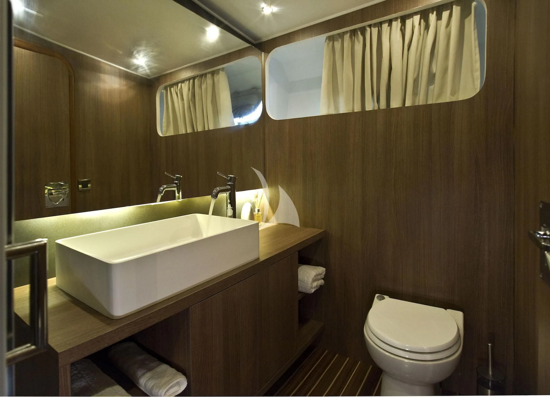 a bathroom with a sink and toilet aboard OCEANE II Yacht for Sale