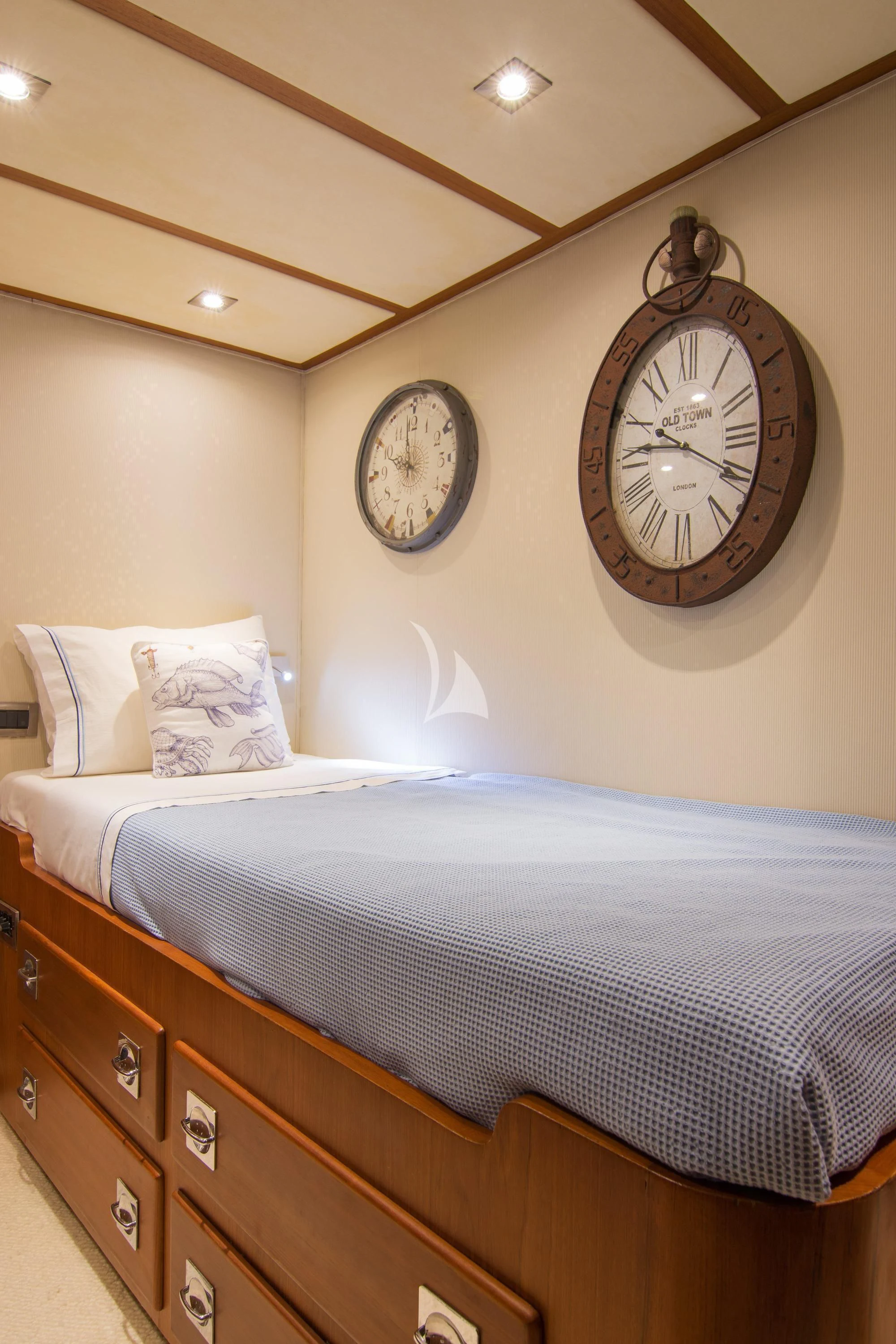 a clock on a wall aboard OCEANE II Yacht for Sale