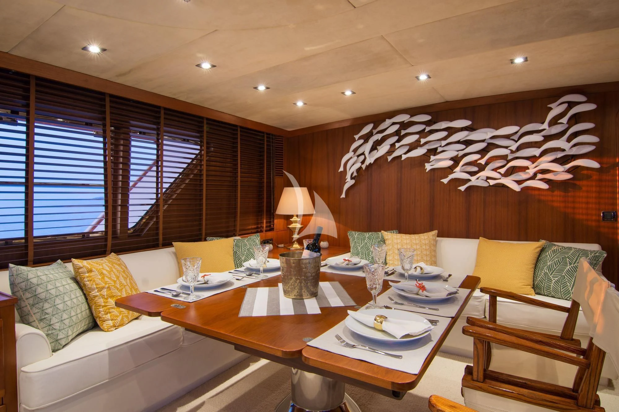 a living room with a couch and a table aboard OCEANE II Yacht for Sale