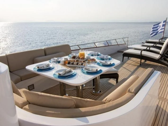 a table with food on it aboard OCEANE II Yacht for Sale
