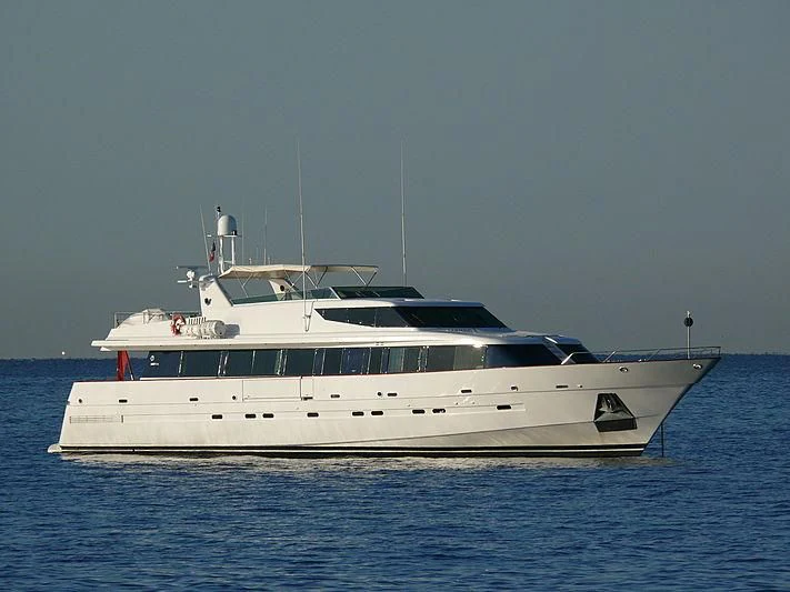 a white yacht in the water aboard PROVIDENCE Yacht for Sale