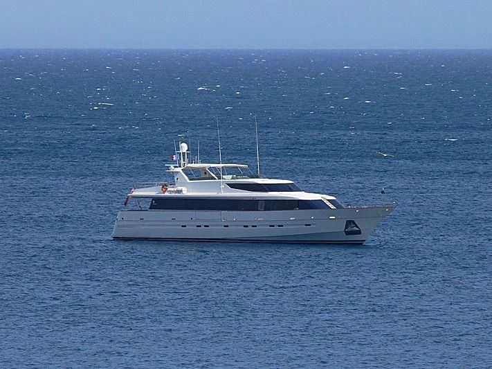 a white boat in the water aboard PROVIDENCE Yacht for Sale