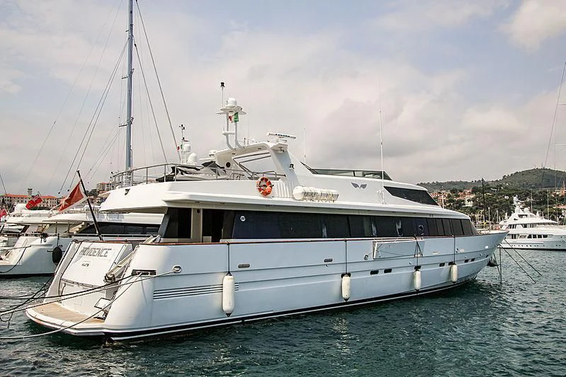 a white yacht in the water aboard PROVIDENCE Yacht for Sale